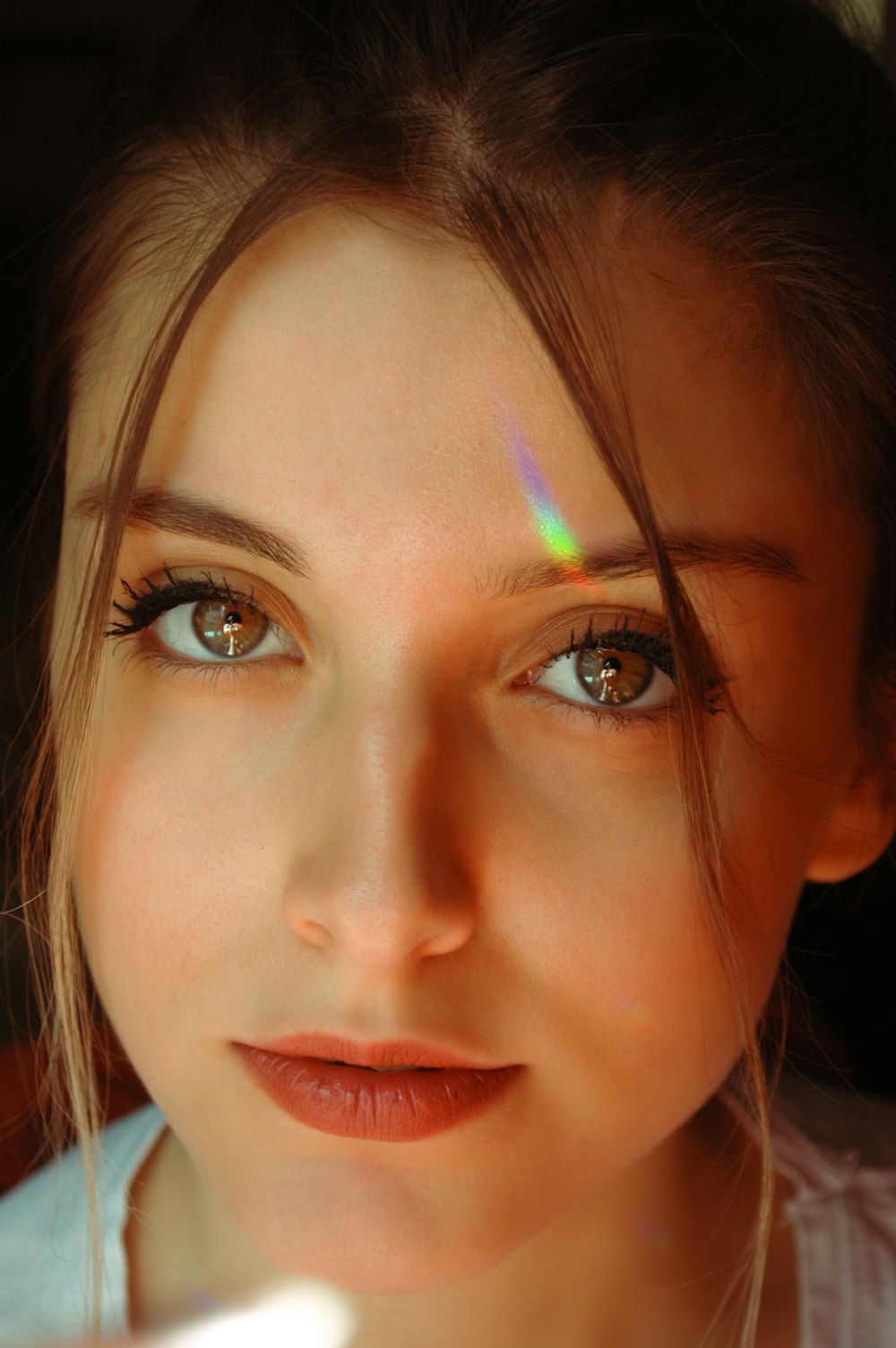 woman with blue eyes and brown hair