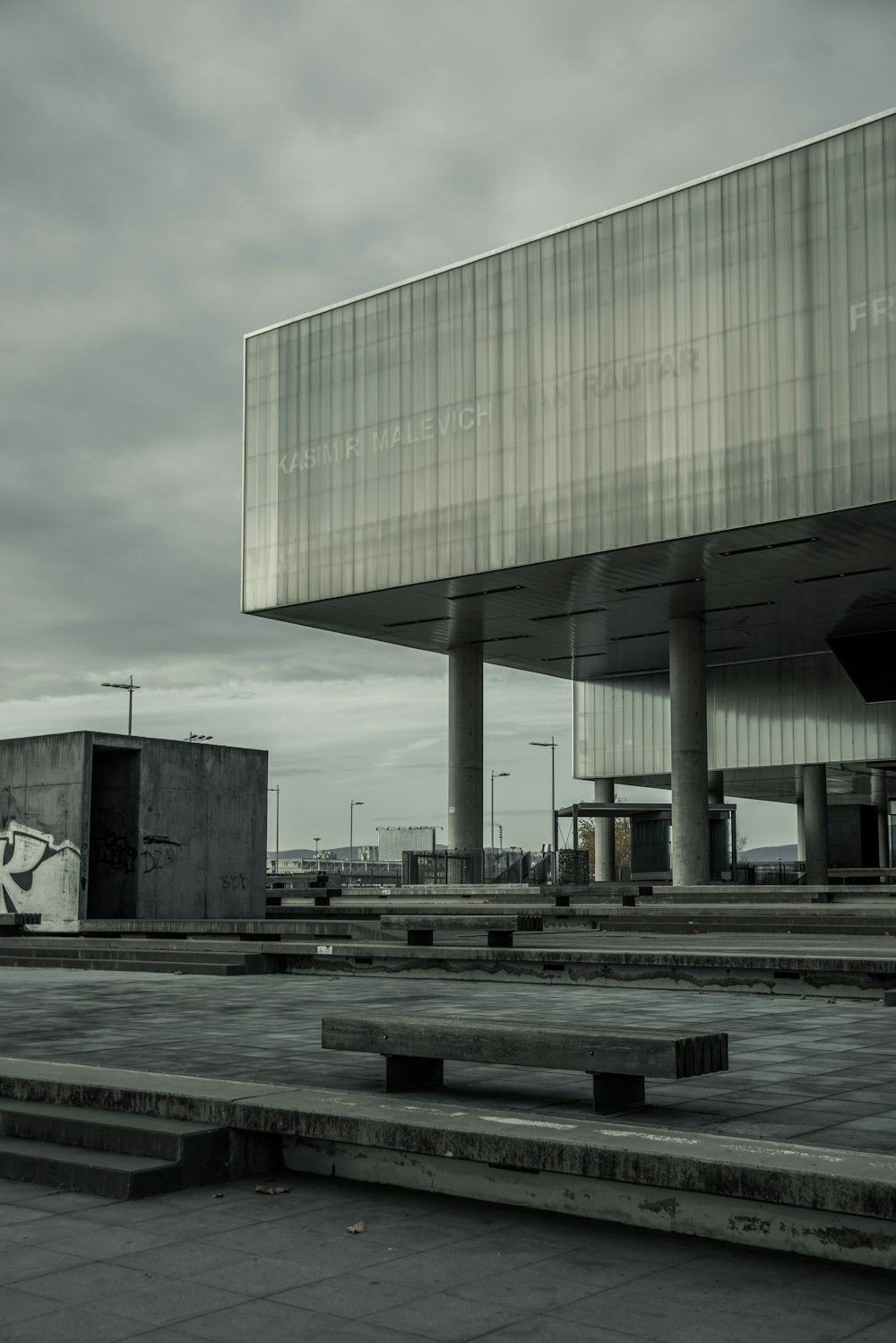 a building that has a lot of concrete steps in front of it