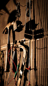 Bright LED work light illuminating a mechanic’s workspace with sharp shadows.