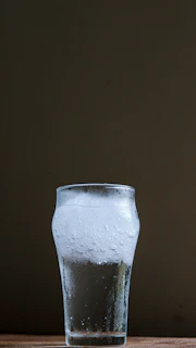 clear drinking glass with water
