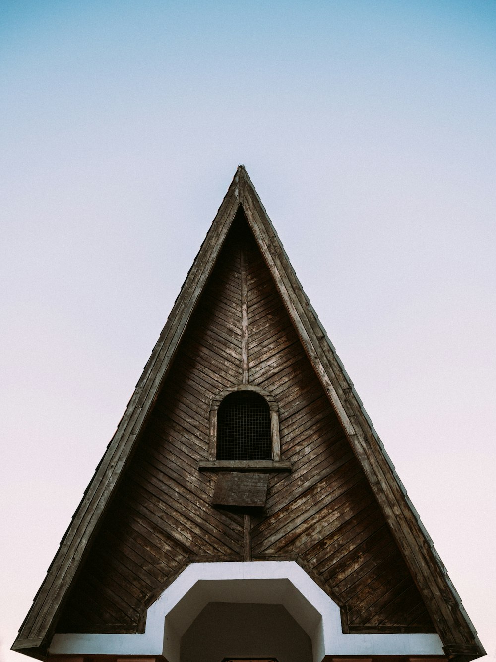 brown wooden house under blue sky during daytime