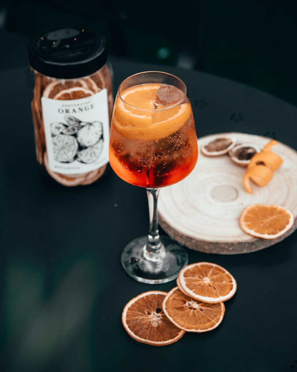 clear wine glass with orange liquid