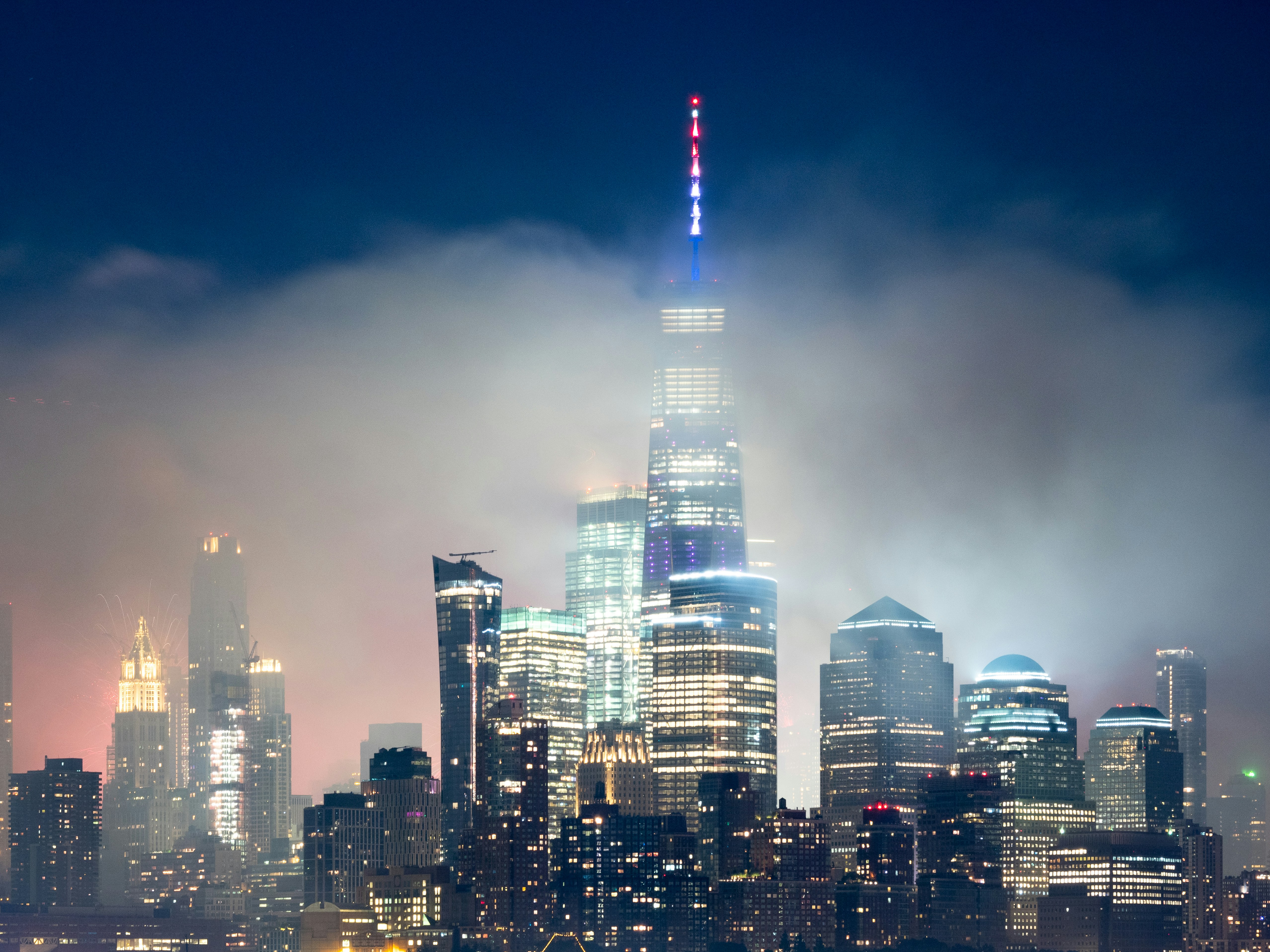 city skyline during night time