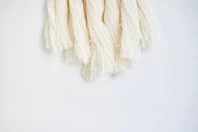 white textile on white surface