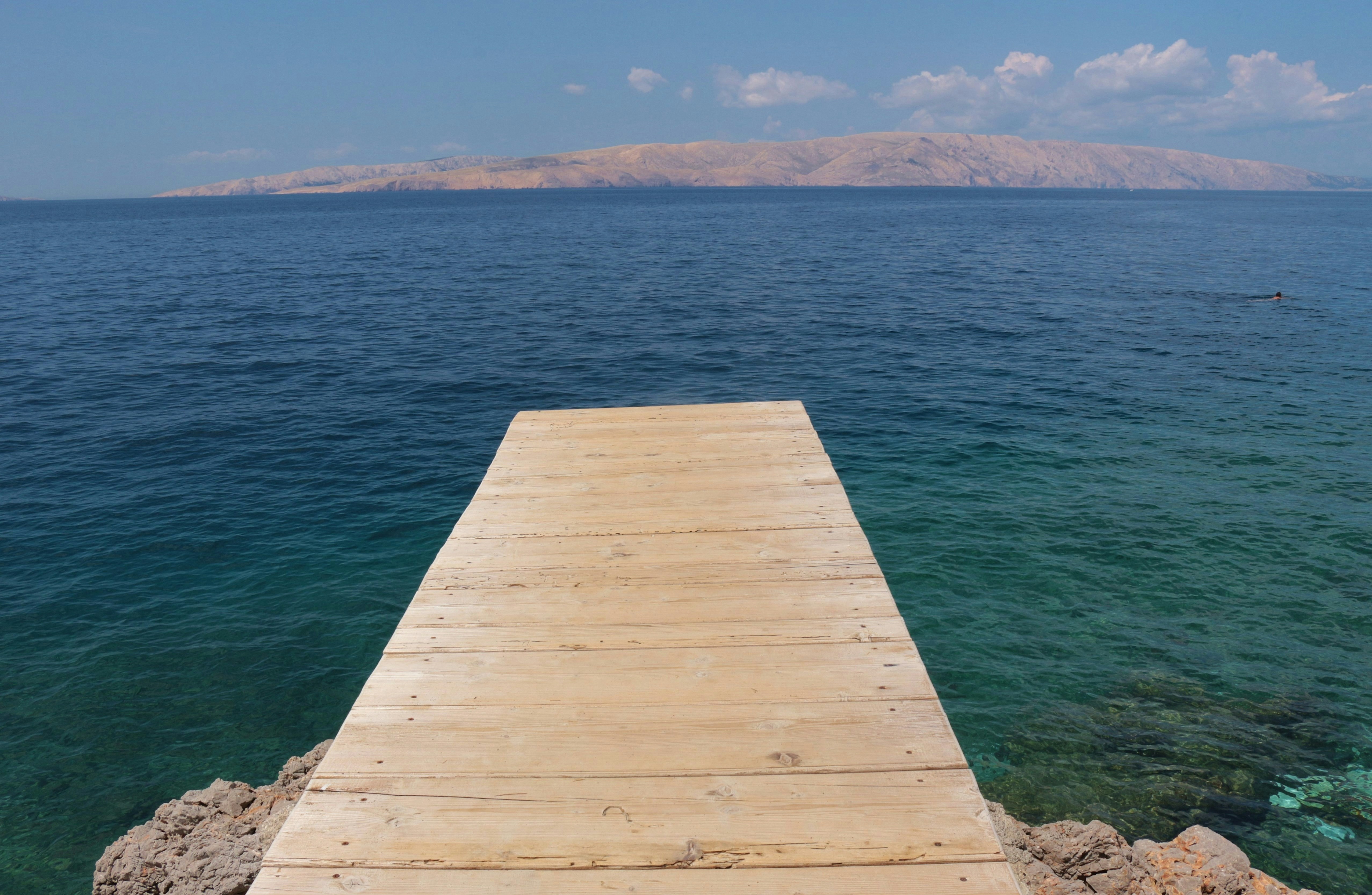Springboard into the adriatic sea. On the coast of Senj, Croatia, South Europe.