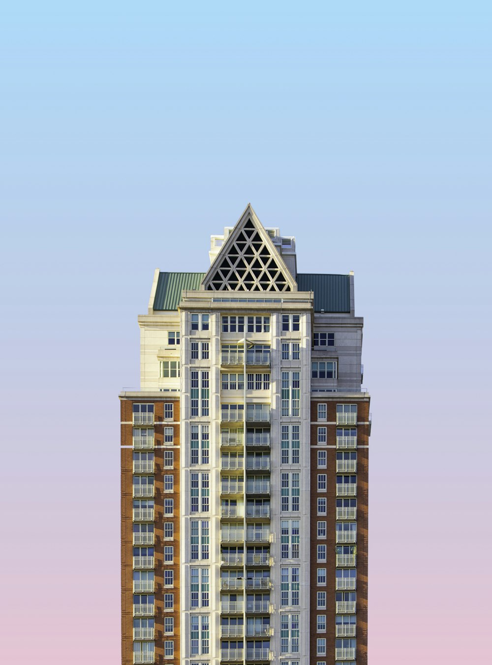 brown and white concrete building under blue sky during daytime