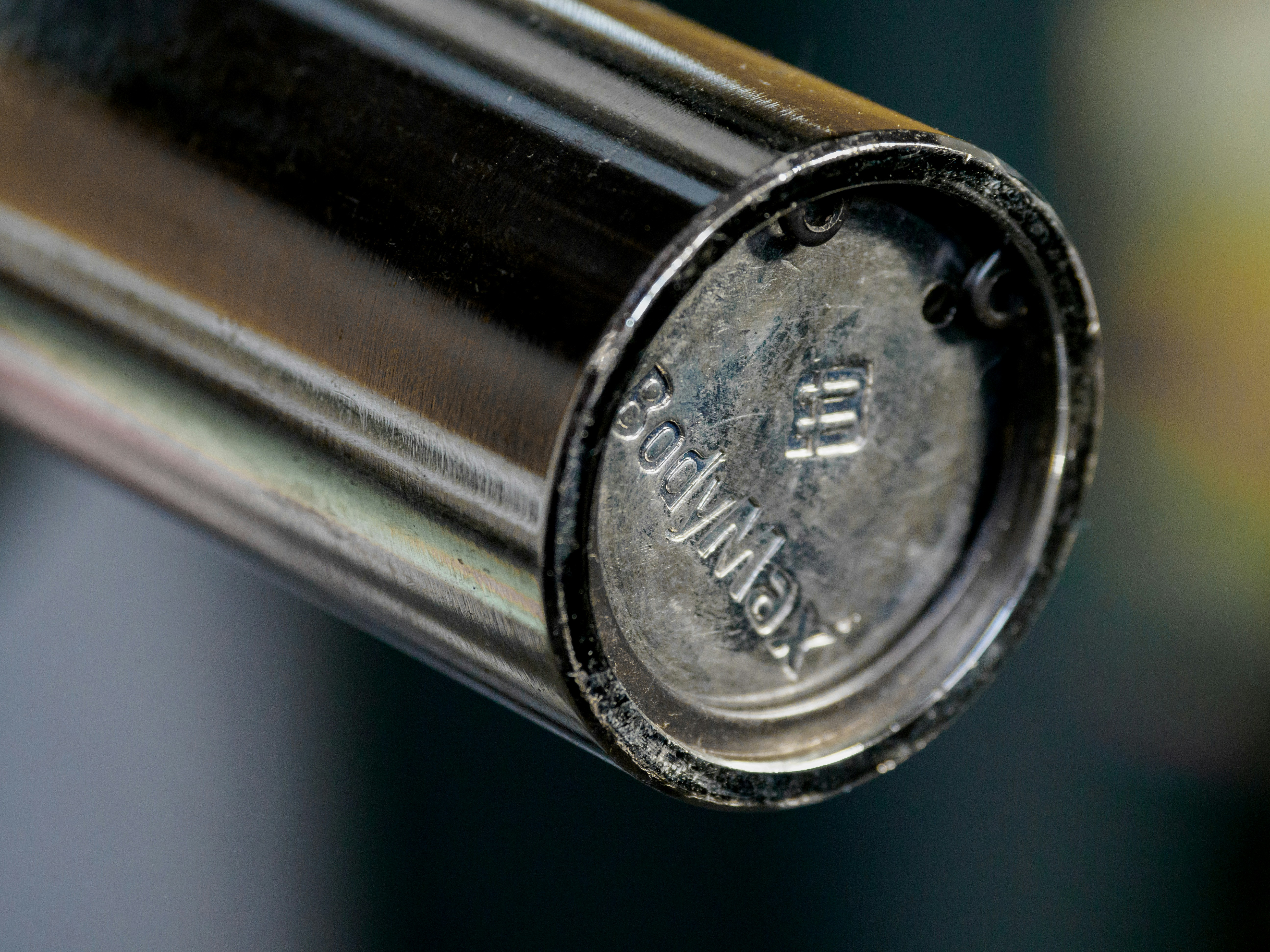 Students gathered in a hostel common area, some looking worried, discussing food options on their phones.