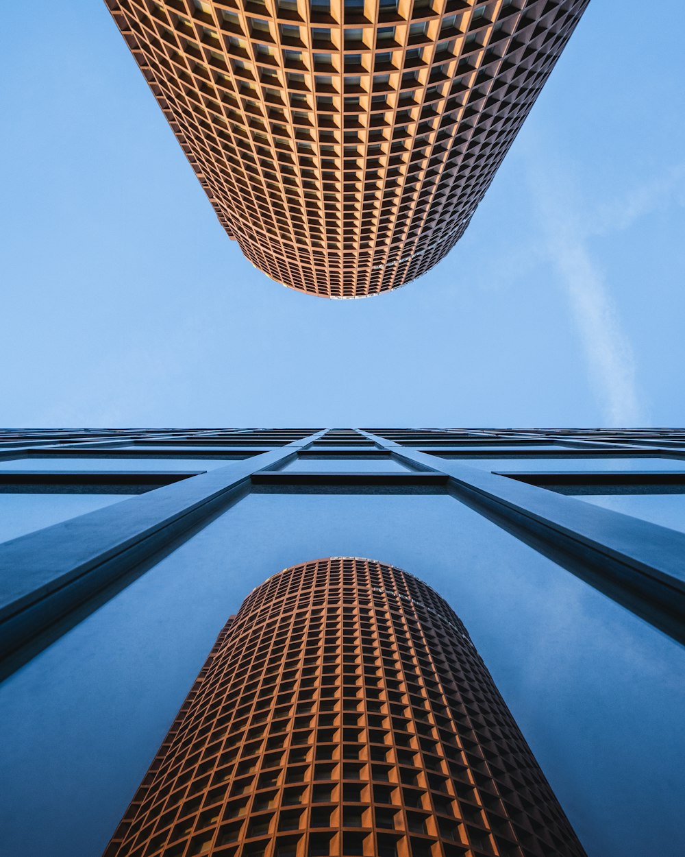 low angle photography of brown high rise building