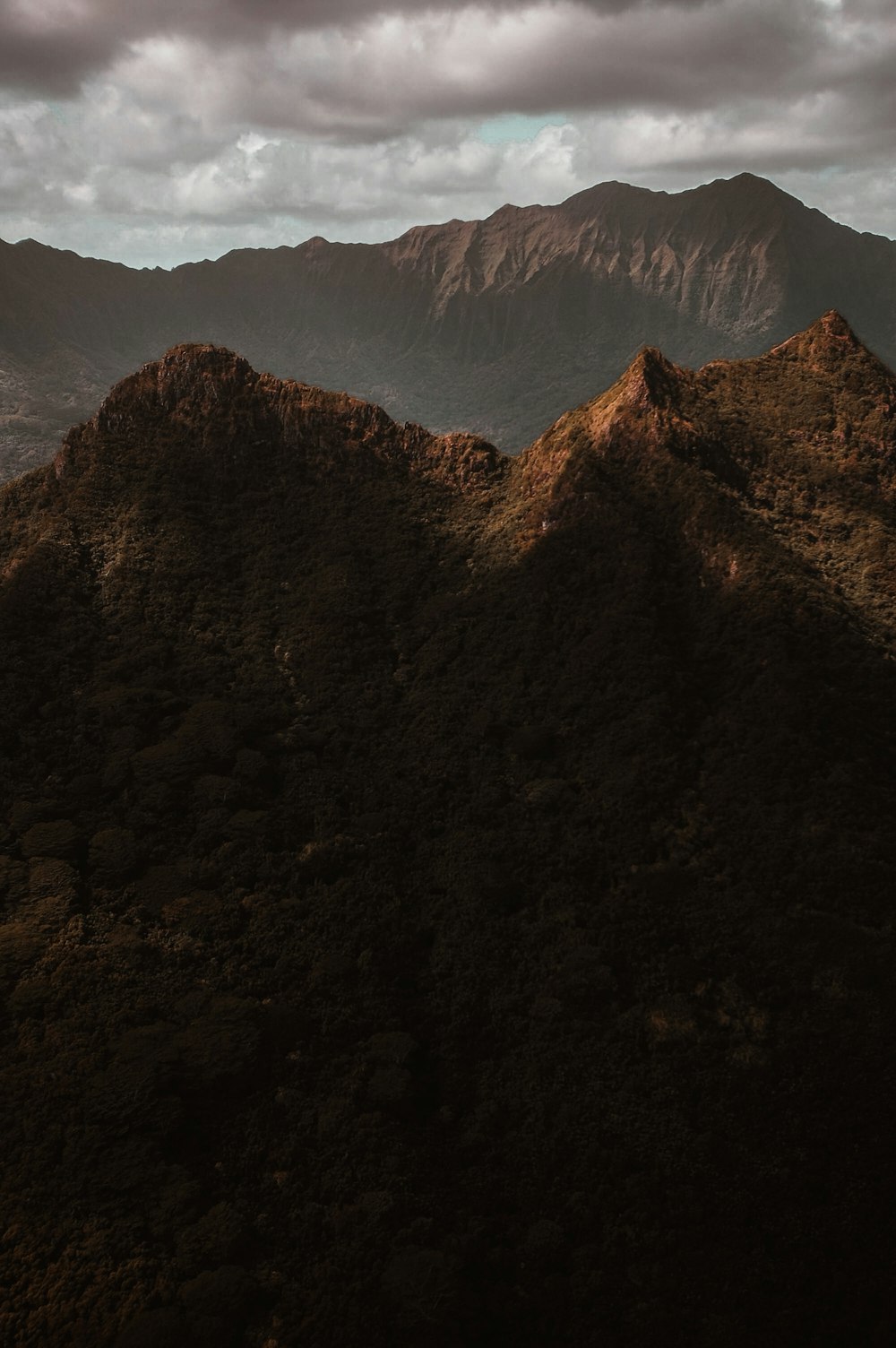 brown mountain under blue sky during daytime