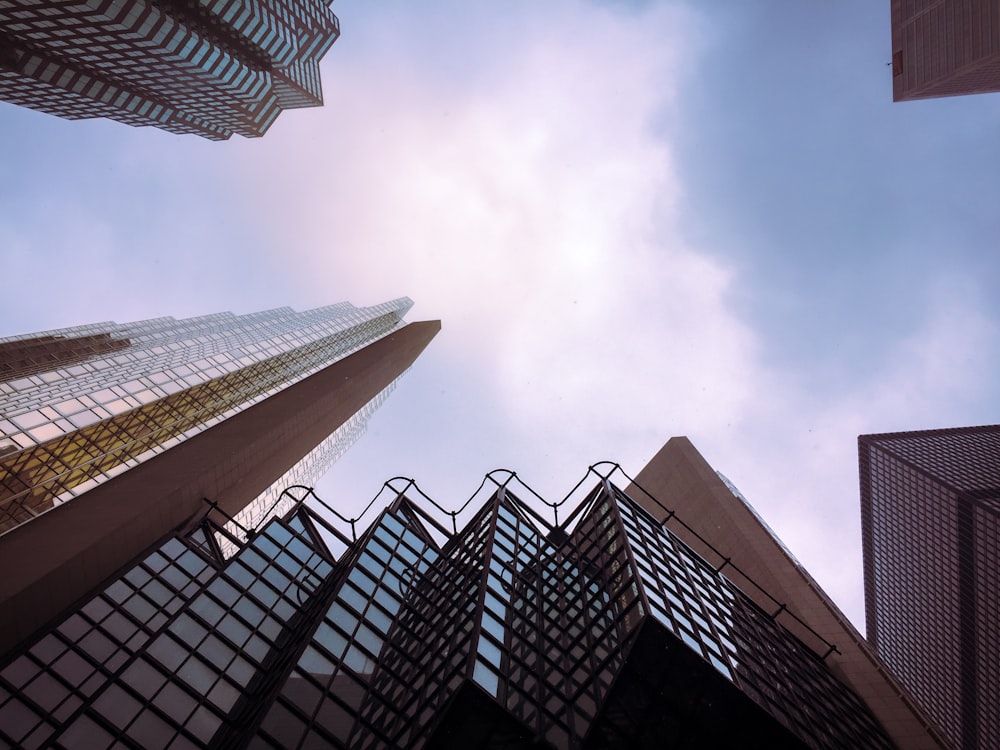 low angle photography of high rise buildings