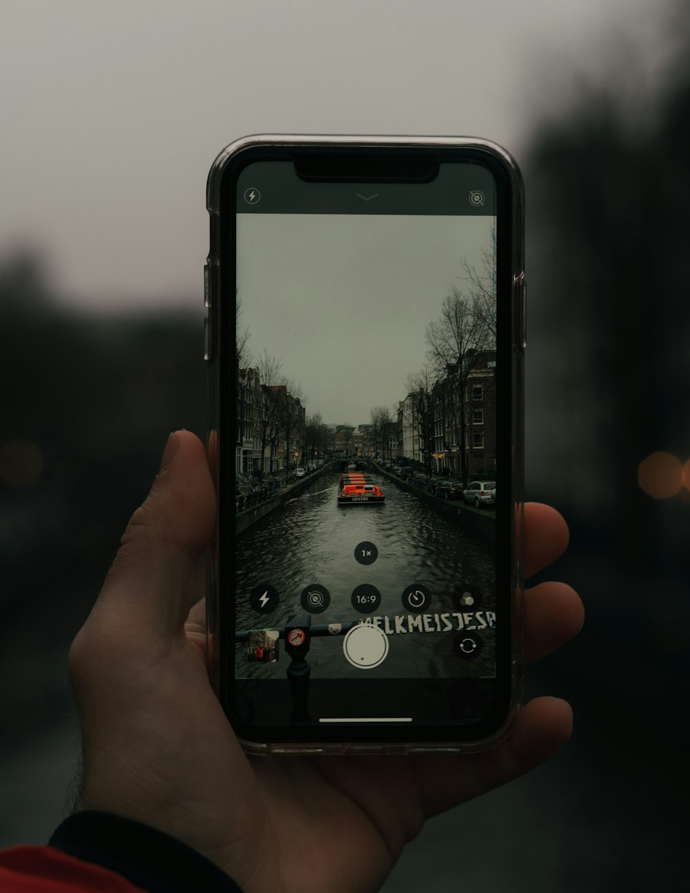 person holding black iphone 5 photo – Free Netherlands Image on Unsplash