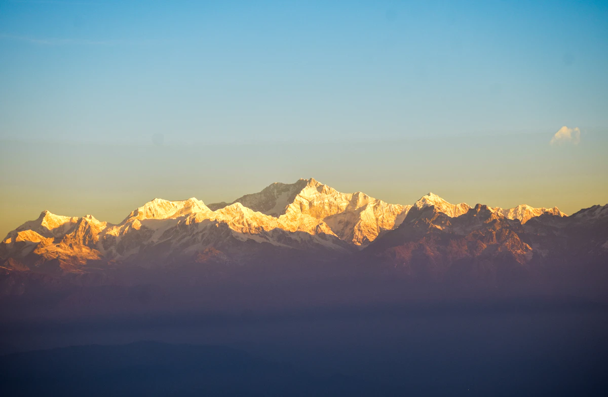 Golden first light on the Kanchenjunga snow peaks at dawn