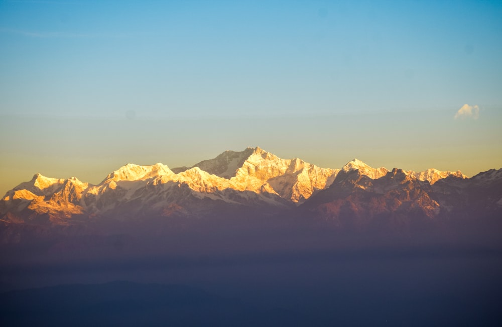 snow covered mountains during daytime