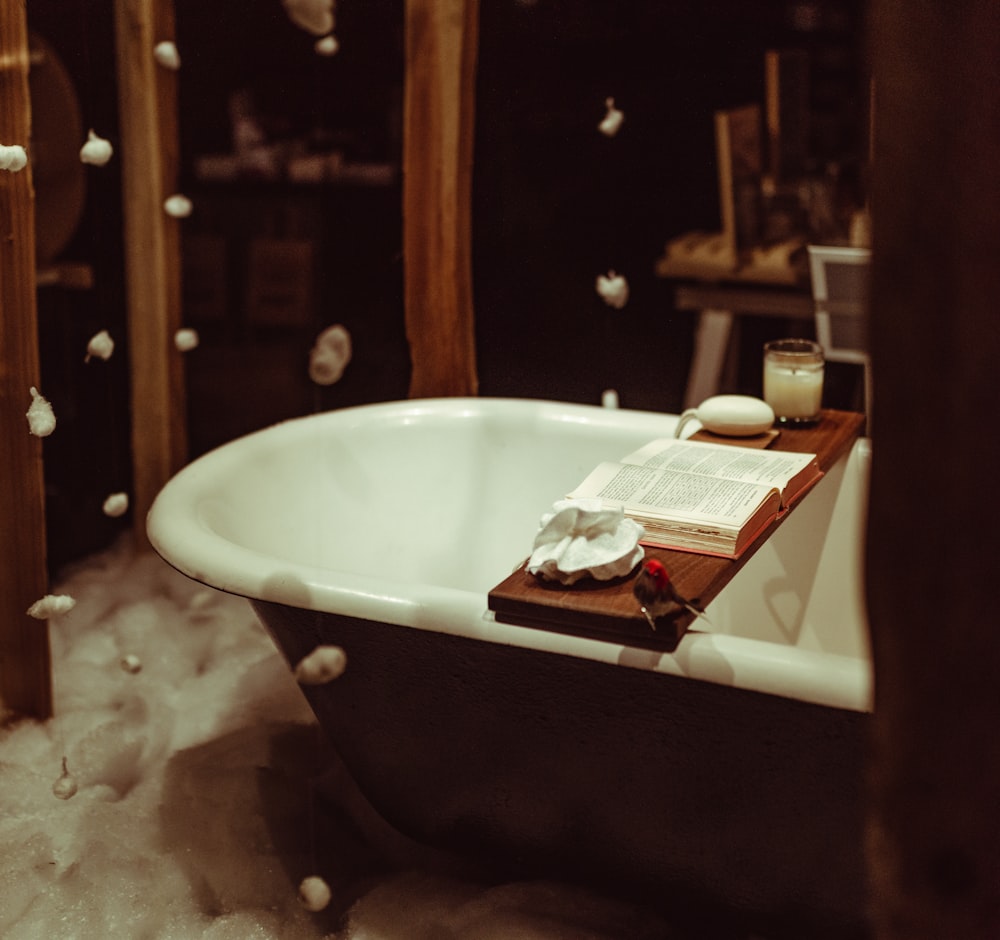 white ceramic bathtub with white ceramic bathtub