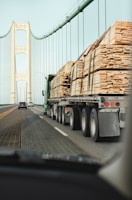 white truck on gray road during daytime