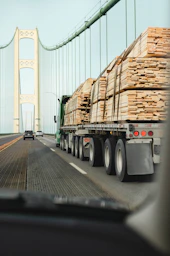 white truck on gray road during daytime