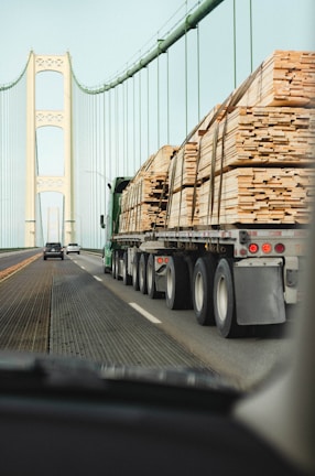 white truck on gray road during daytime