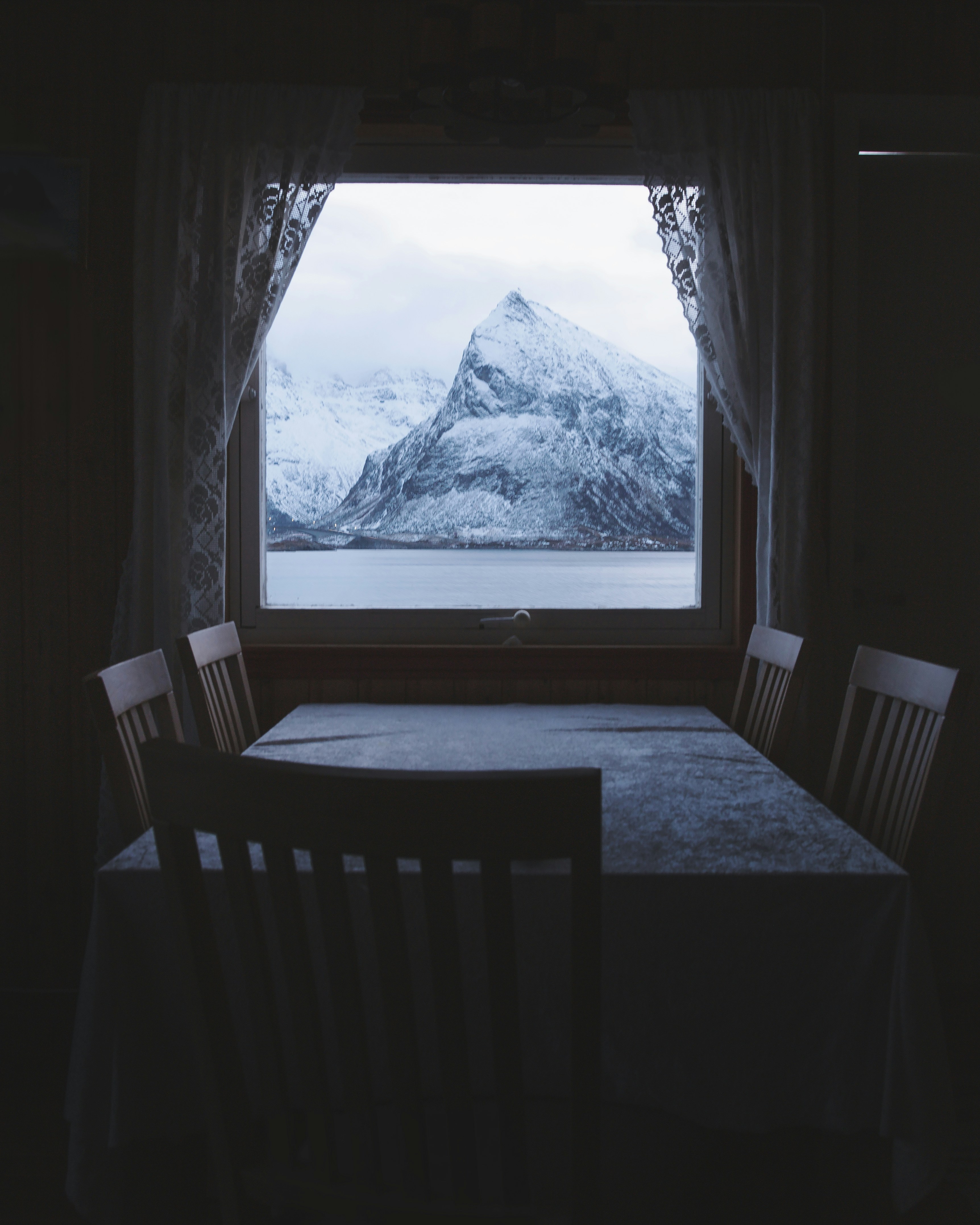 brown wooden table and chairs