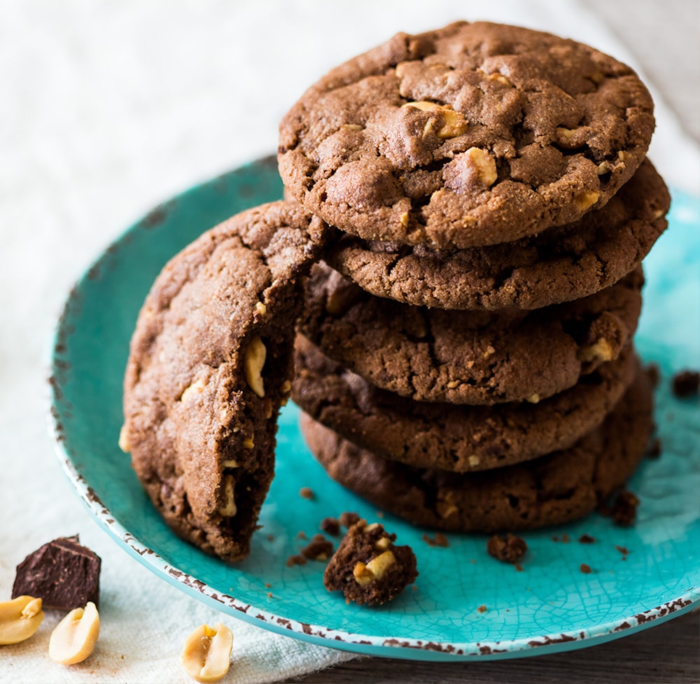 brown cookies on blue and white ceramic plate