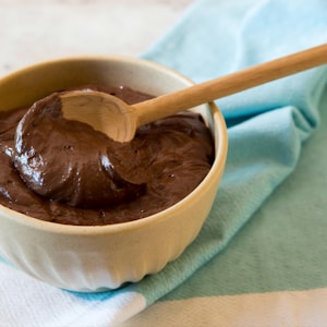 brown chocolate on white ceramic bowl