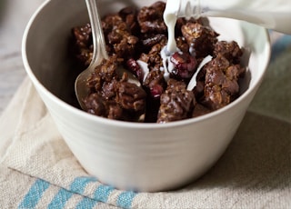 chocolate ice cream in white ceramic bowl