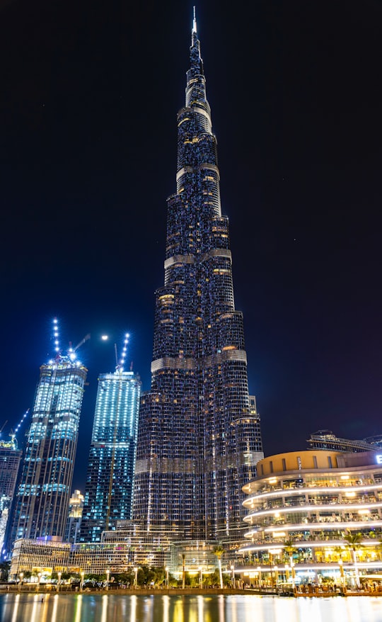 high rise building during night time in Burj Park United Arab Emirates