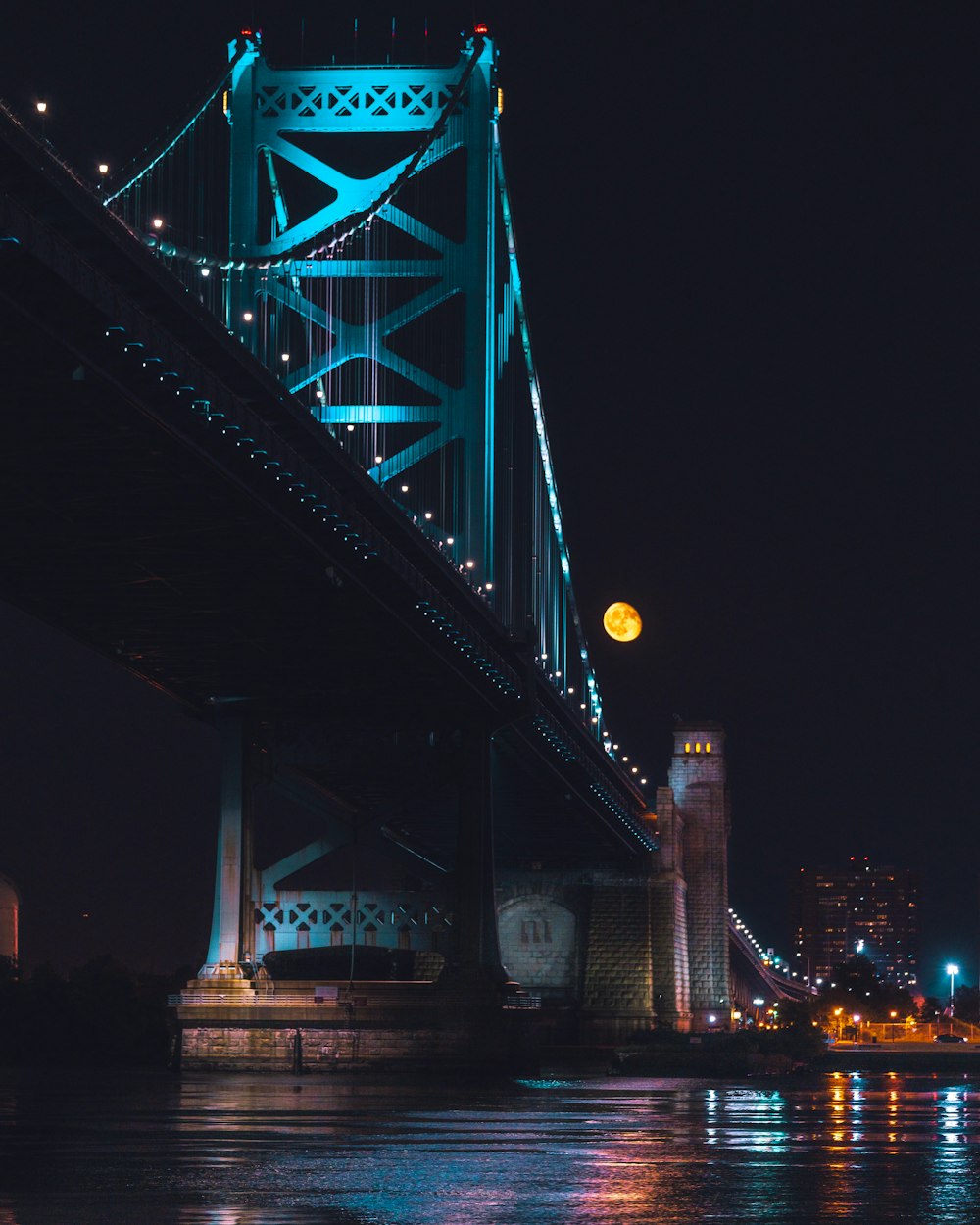 lighted bridge during night time