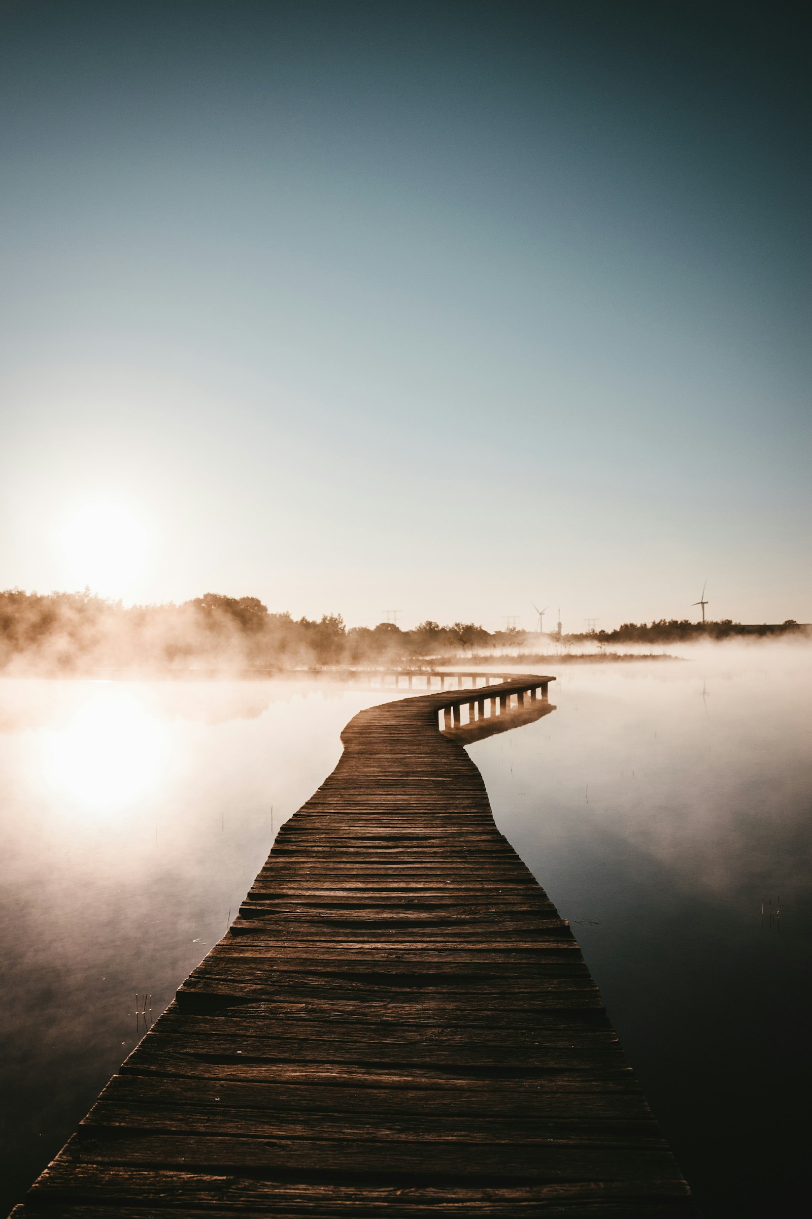 Nikon D3300 + Nikon AF-S DX Nikkor 18-105mm F3.5-5.6G ED VR sample photo. Brown wooden dock on photography