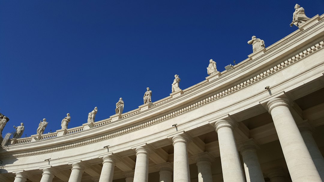 white concrete building under blue sky during daytime
