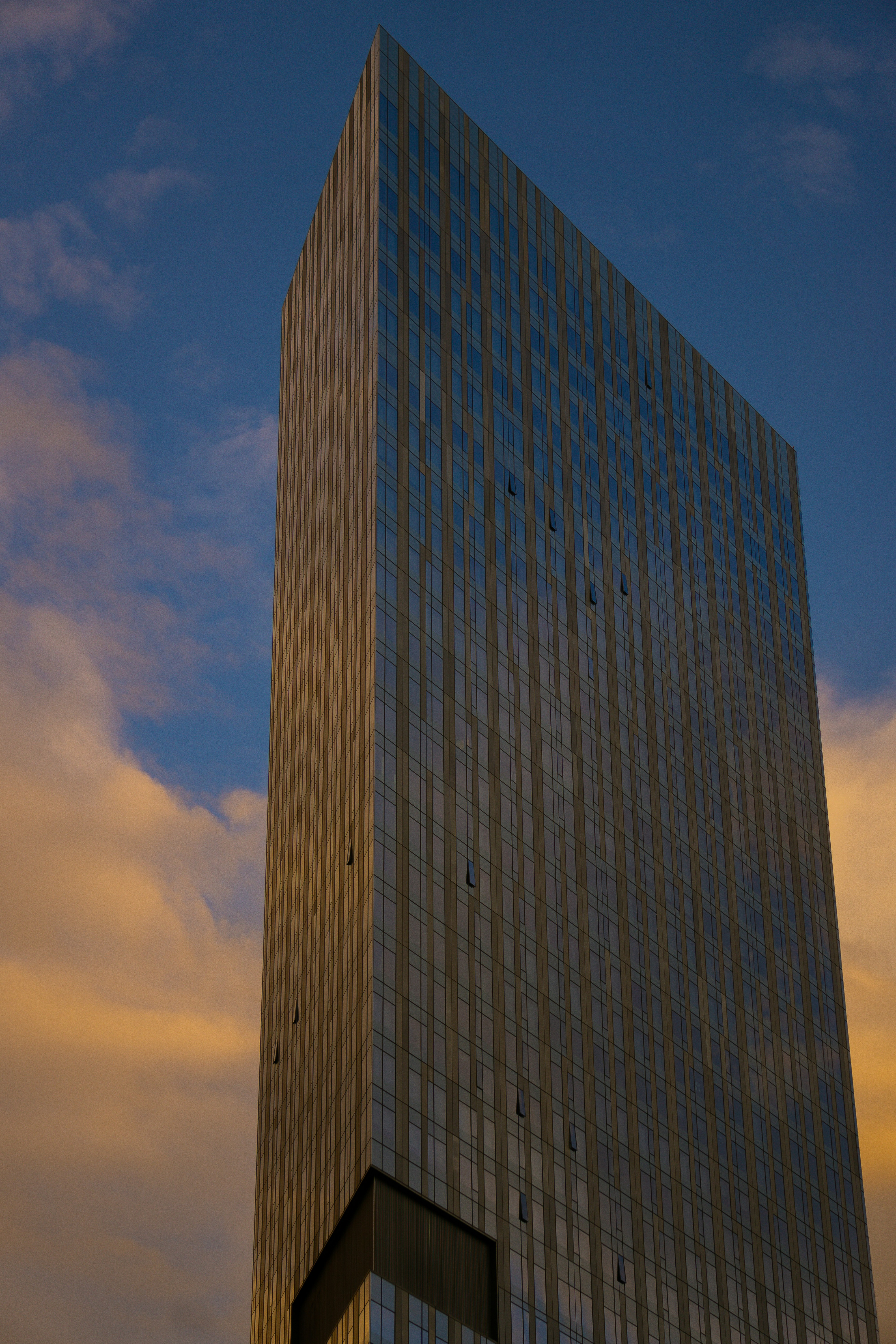 brown concrete building under blue sky during daytime