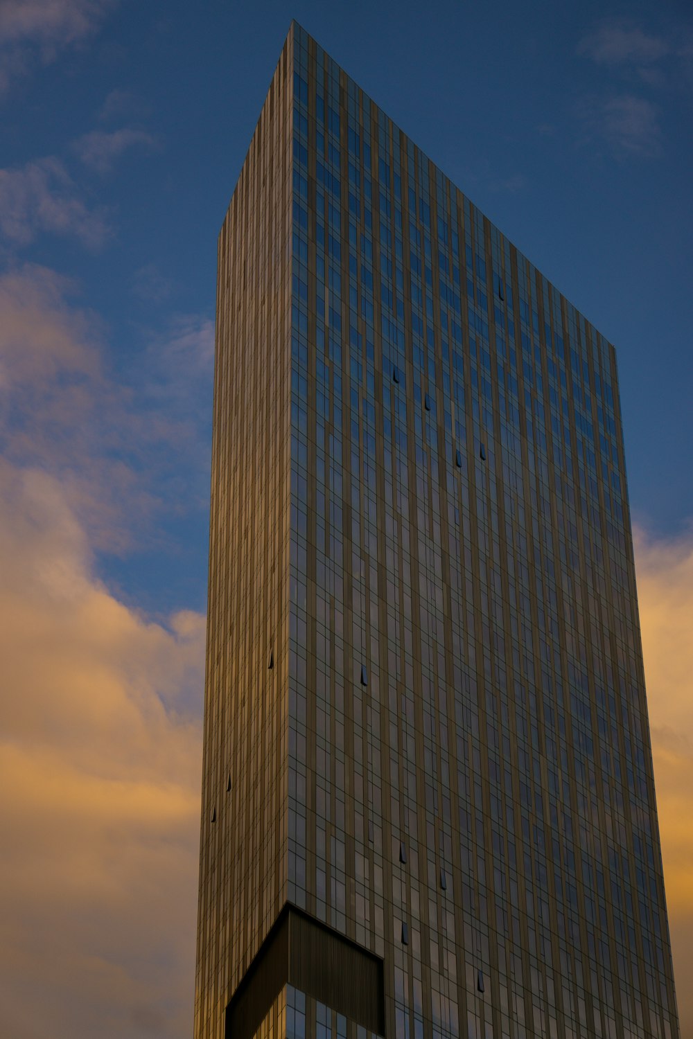 brown concrete building under blue sky during daytime