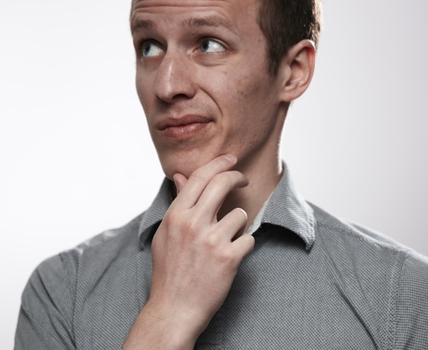 man in gray button up shirt