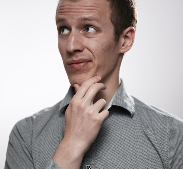 man in gray button up shirt