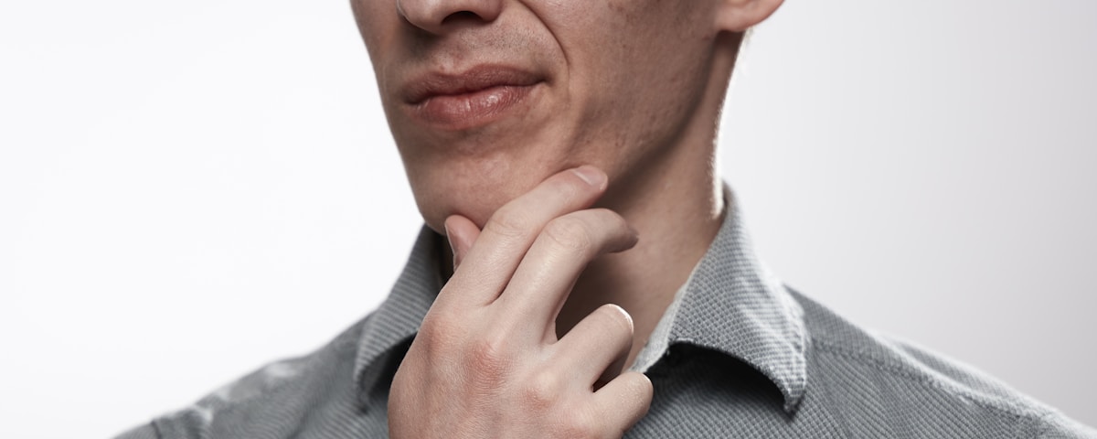 man in gray button up shirt