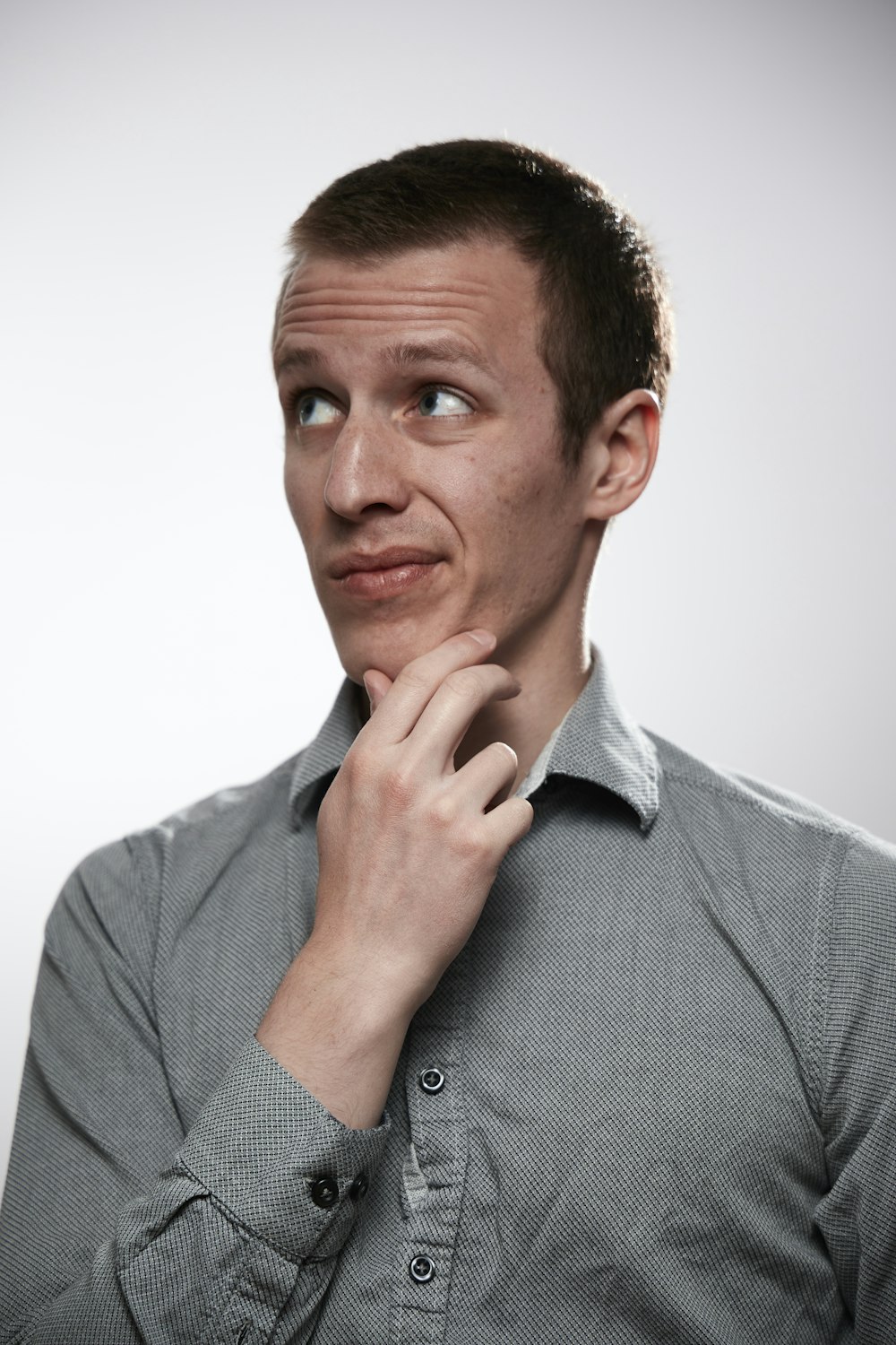 man in gray button up shirt