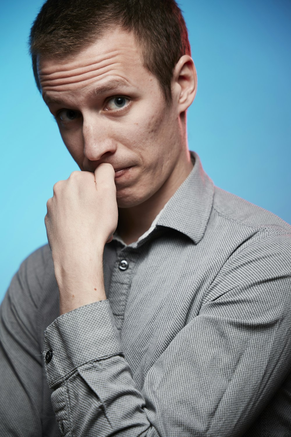 man in gray button up shirt