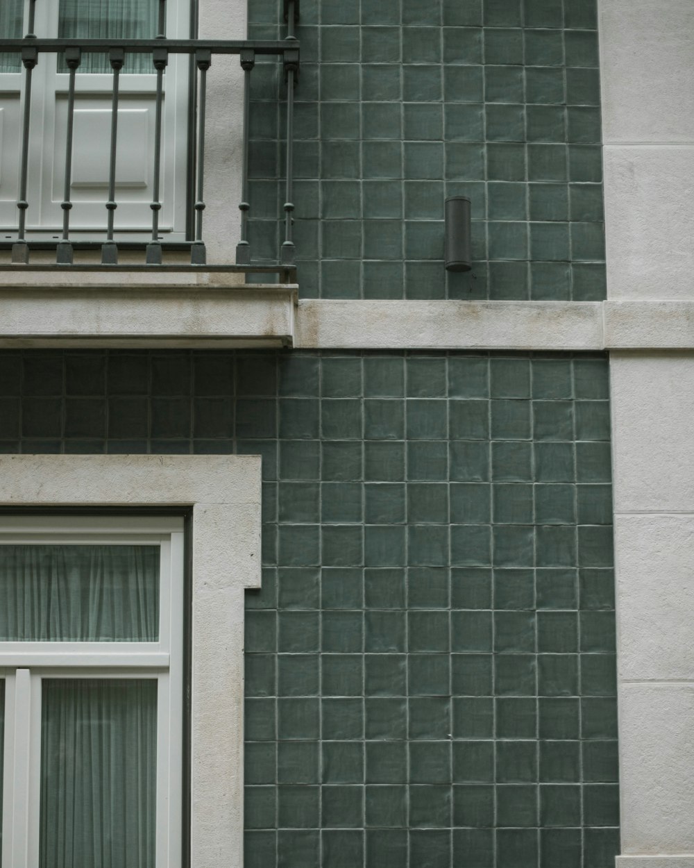 brown brick wall with white window frame