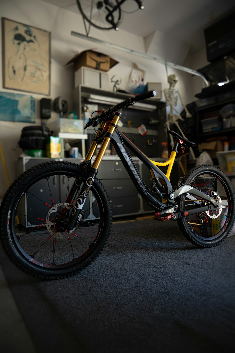 yellow and black full suspension mountain bike