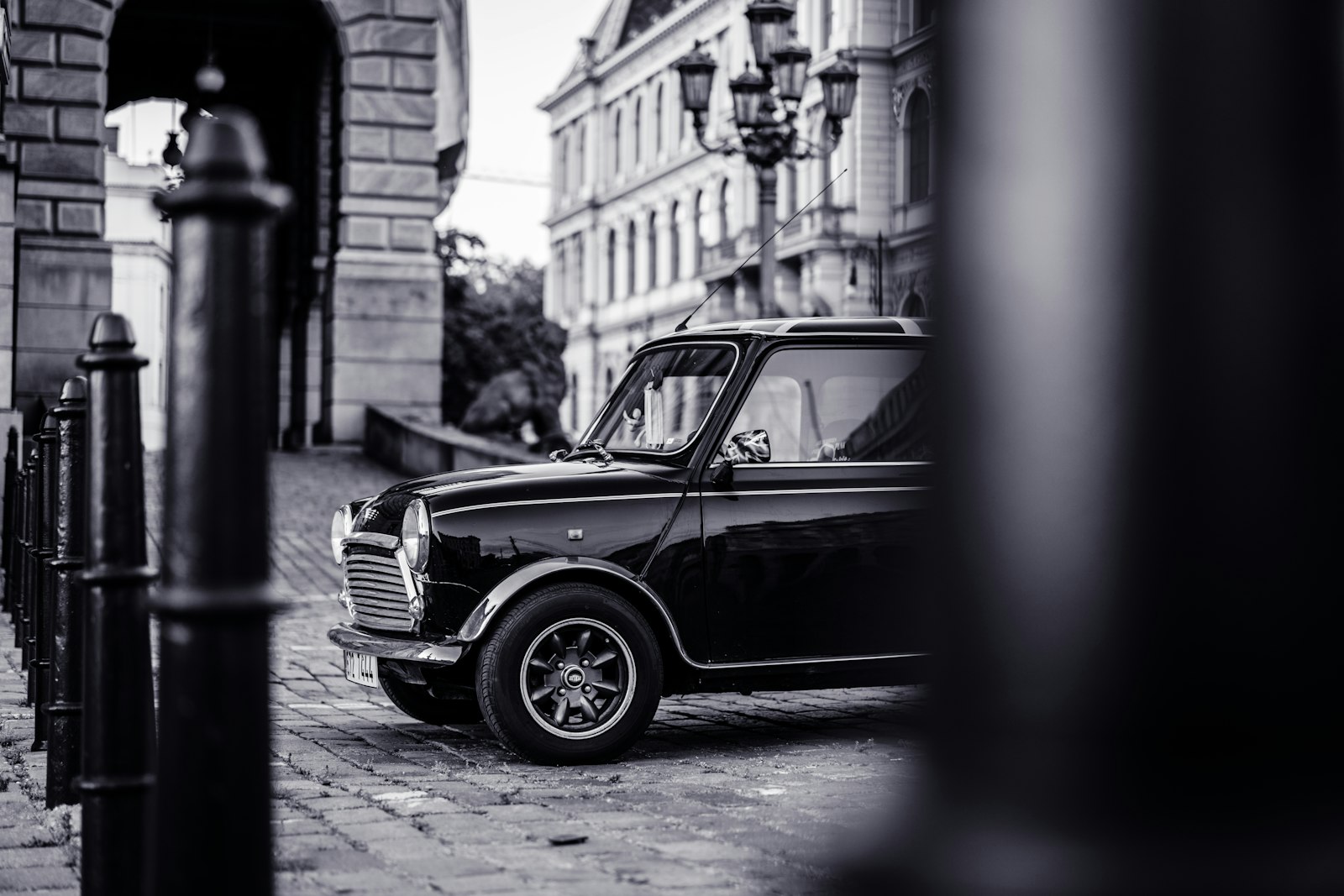 Sony a7R IV + Sony Sonnar T* FE 55mm F1.8 ZA sample photo. Grayscale photo of car photography