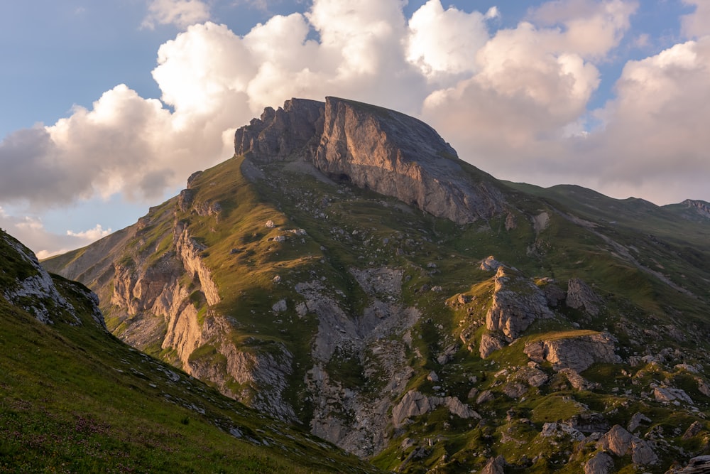 a large mountain with a very tall peak