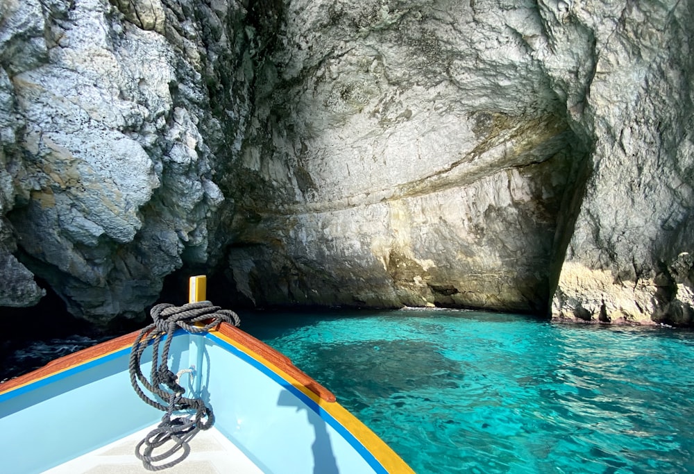 blue kayak on blue water