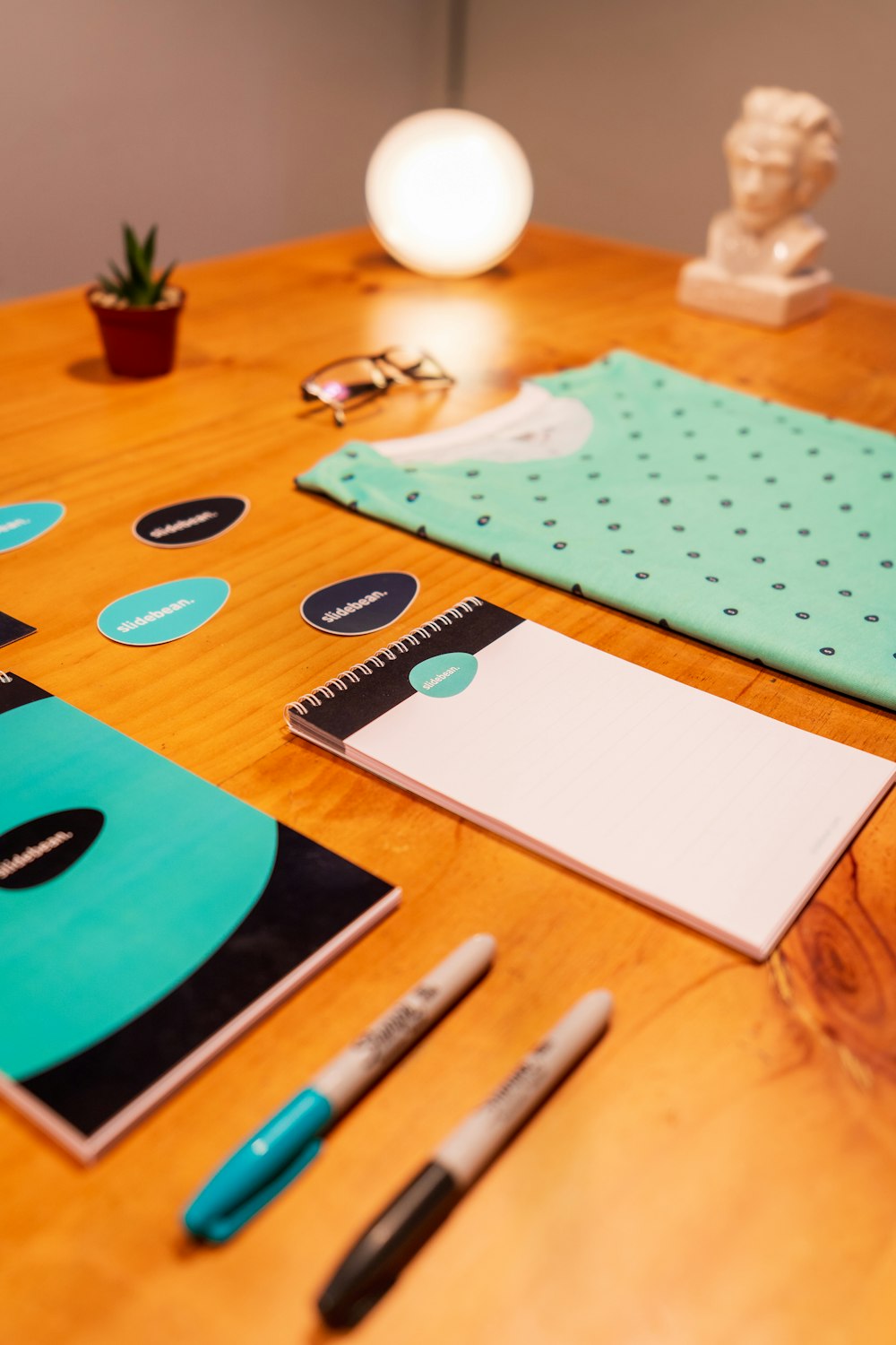 white and blue polka dot paper on brown wooden table