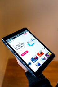 black android smartphone turned on displaying icons