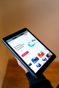 black android smartphone turned on displaying icons