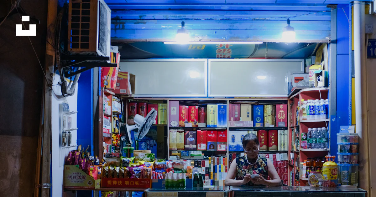 Red Store Background Red and black store front photo – Free Human Image on Unsplash