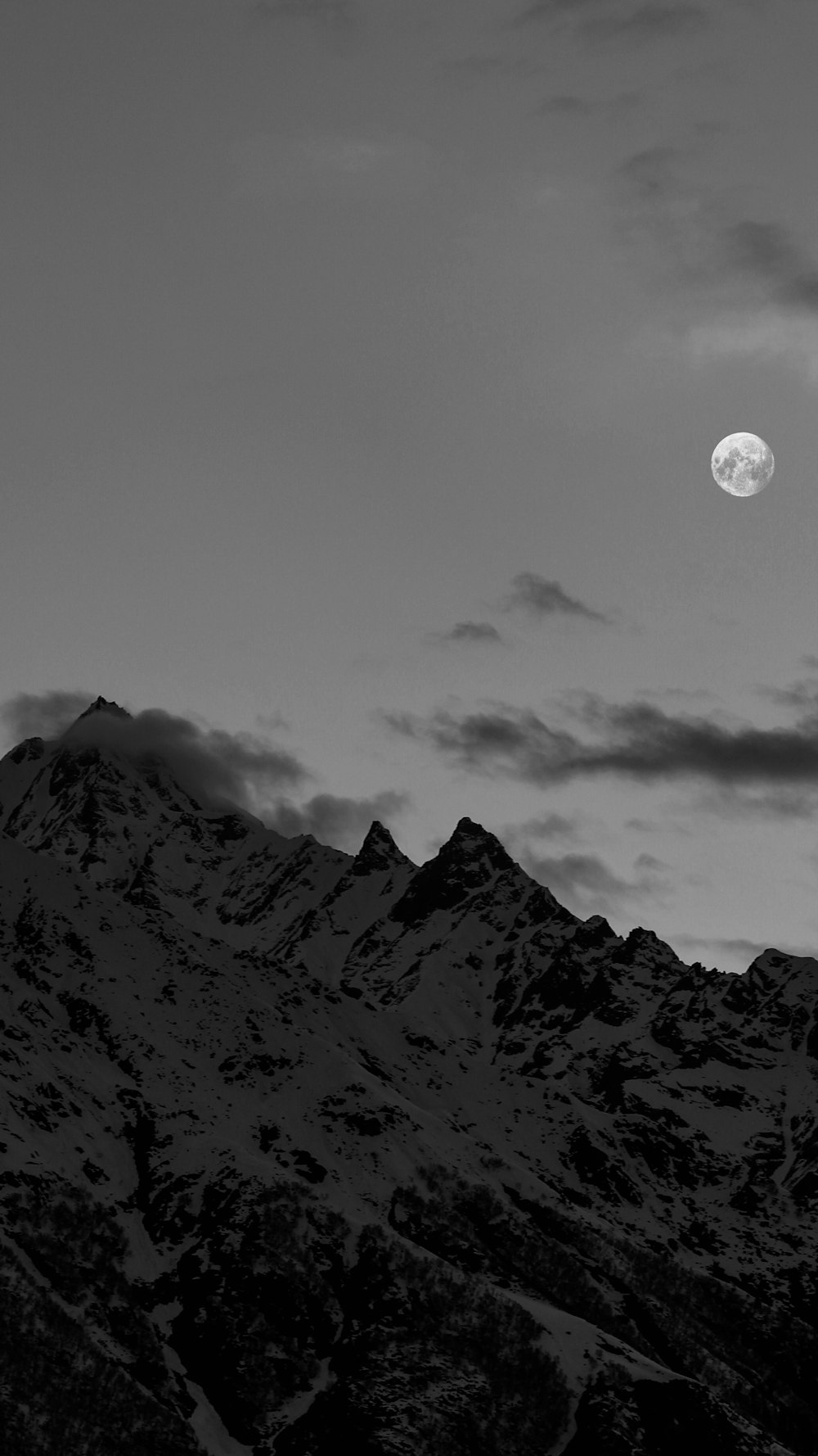 grayscale photo of mountain range