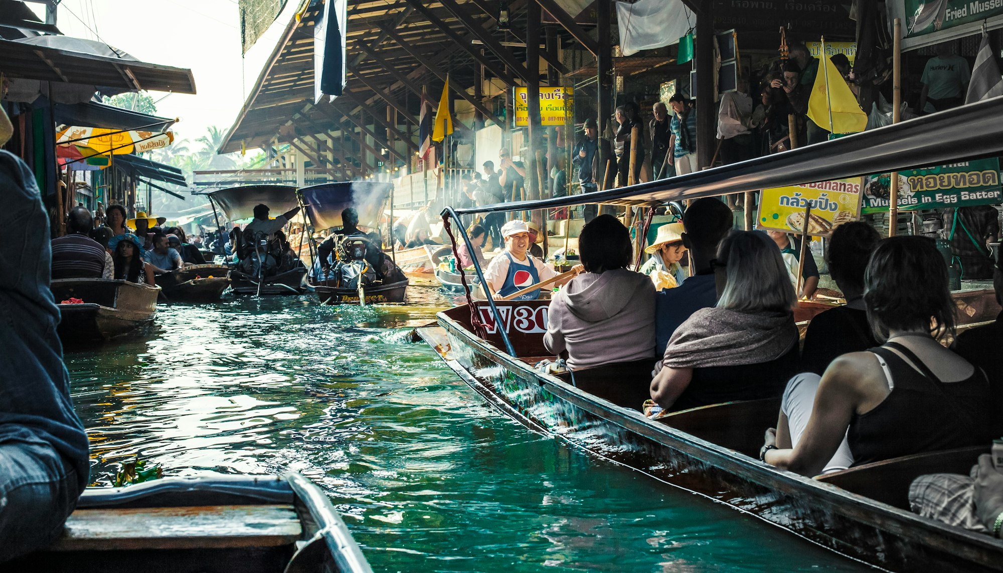 The Damnoen Saduak floating market is a more authentic floating marketing outside of Bangkok that has countless narrow canals, fragrances of spices and flavors washing over you moment after moment, fresh fruits piled high upon on rafts, and a raw experience that truly takes you as far away from what a market experience usually is.