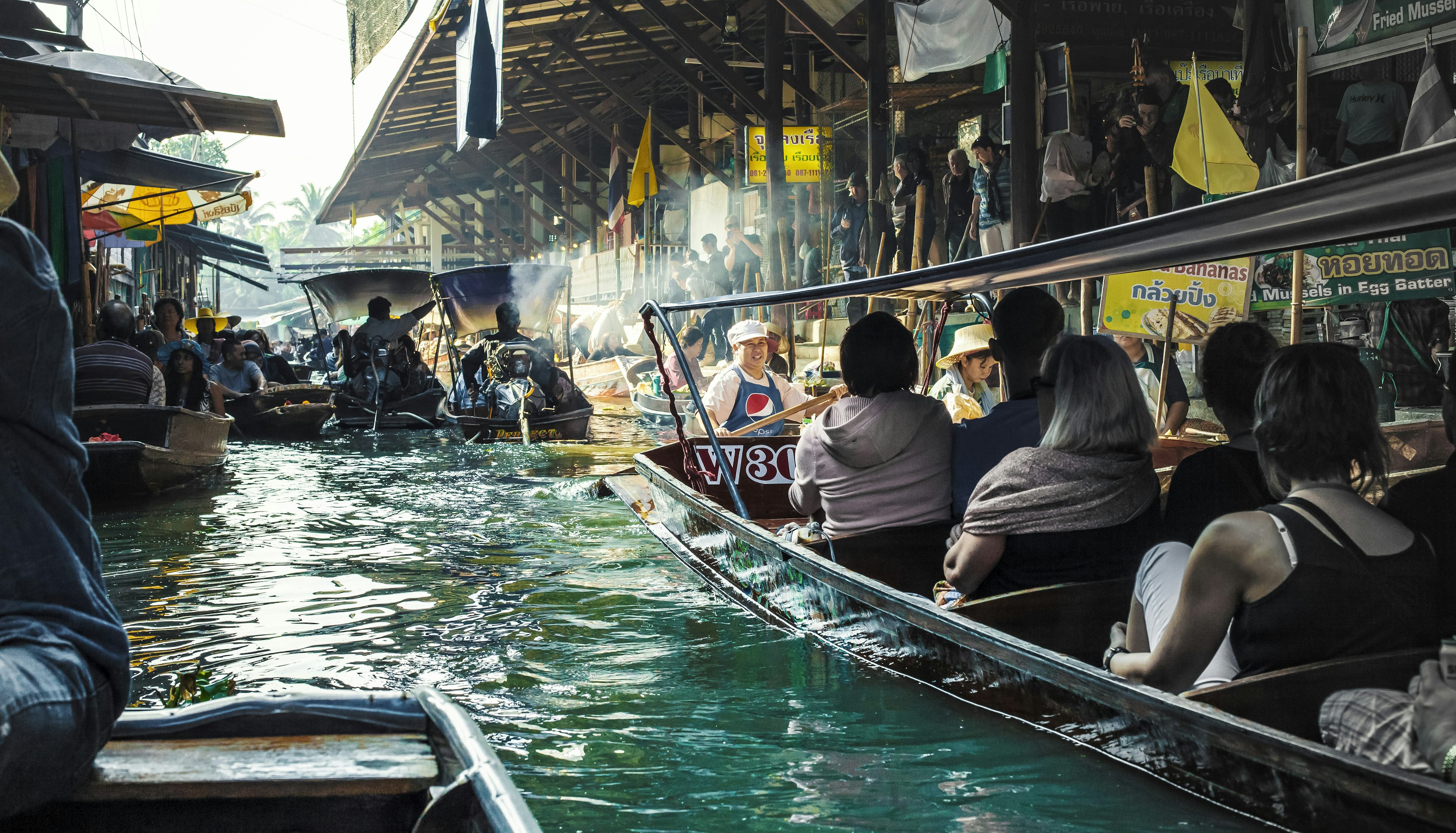 A bustling floating market in Thailand