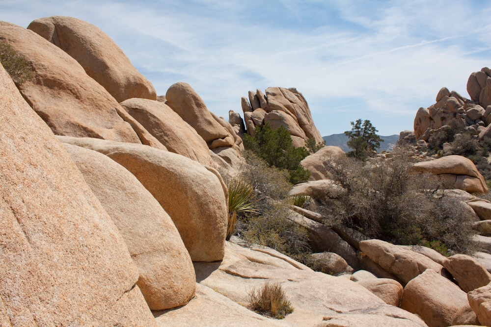 brown rock formation under blue sky during daytime