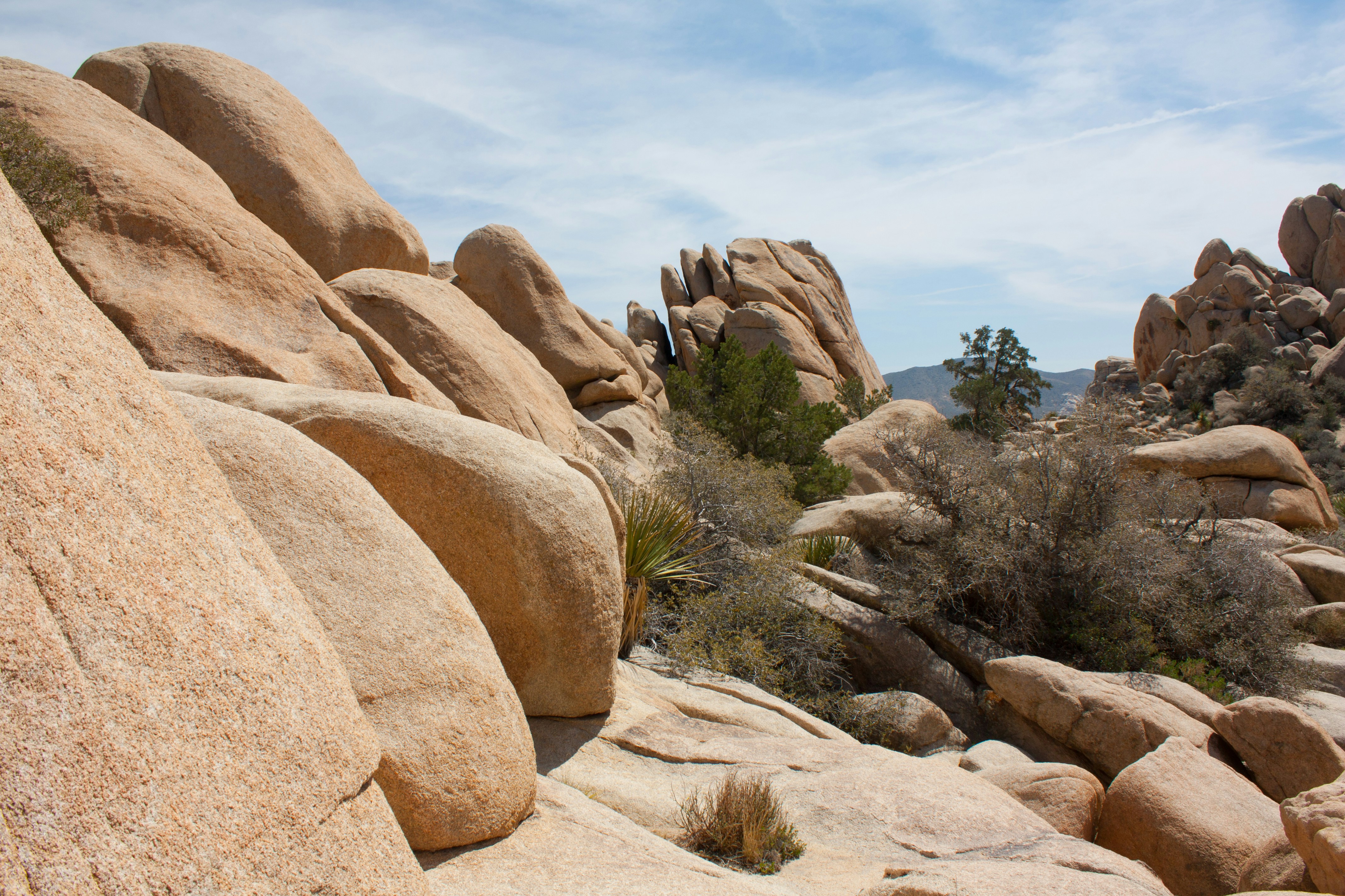 brown rock formation under blue sky during daytime